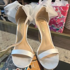 Lulus Ayanna Ivory Satin Bow Ankle Strap Pumps